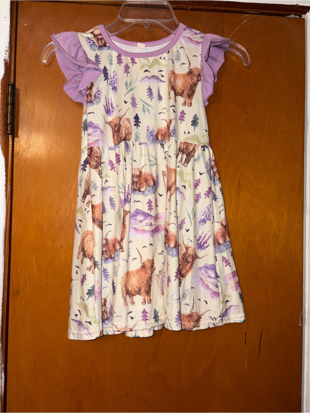 Cream Girls Dress with Purple Highland Cow Print and Ruffle Sleeves